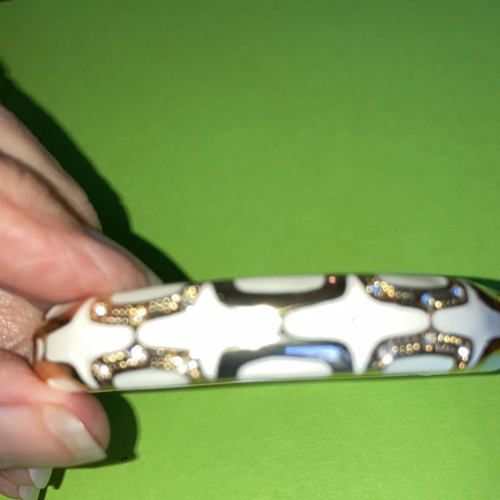 NWOT hinged rd. bracelet w/white enamel between gold designs. $25 - Picture 6 of 6